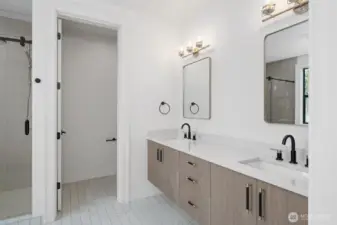 Double vanities and floating Belmont cabinets in Primary