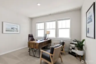 Bed 1 staged as an office. Photo rendering is representational. Actual home is under construction and finishes, elevation, and paint colors may vary. See site agent for details.