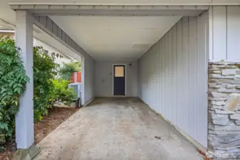Convenient attached one-car carport with direct covered entry into the utility/laundry room, perfect for easy unloading and all-weather access