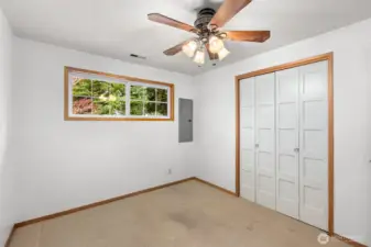 Bedroom 3 featuring a conveniently located electrical box, ideal for tech setups, home office or flexible living space