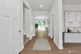 Virtually staged photo of entry way from same plan on different lot, for reference only