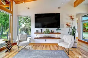 Notice the custom floating shelves in living room.