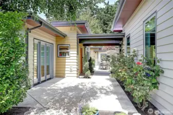 View of the courtyard. Office is on the left and then is the back entry that brings you into the utility room....