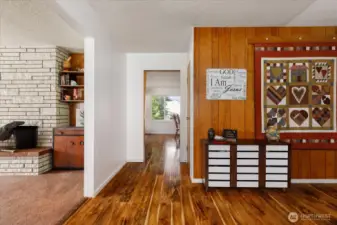 The view as you enter the home, with living room on your left and dining room/family room straight ahead. Kitchen to the right.
