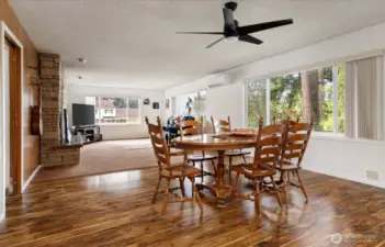 Looking across the dining room toward the family room from the kitchen entry.