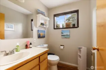 1/2 bath is just outside the laundry room.