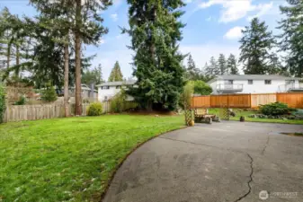 View as you step out back slider into backyard with large patio for entertaining.