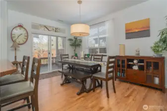 Lovely hardwood floors in dining and kitchen