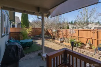 Looking out to your rear yard fully landscaped from your private deck