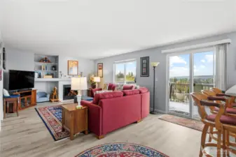 Relax in the cozy family room with a warm and inviting gas fireplace while taking in the breathtaking panoramic views.