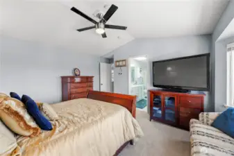 Primary suite offering comfort and beautiful natural light.