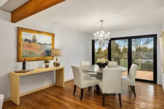 The adjoining dining room can easily hold a large dinner party.