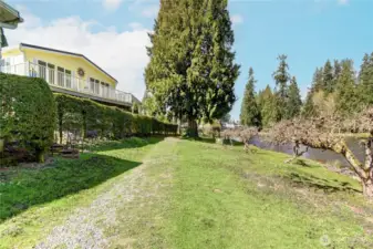 Walkway from home leads directly to trails that follow the ponds.