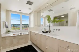 Primary bath with views of the town.