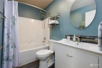 The full guest bath is located between two of the three bedrooms and close to the bonus room.