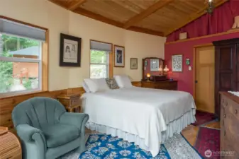 Primary bedroom, main house, with loft area above to right