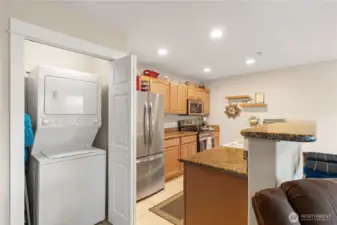 Convenient laundry closet off kitchen