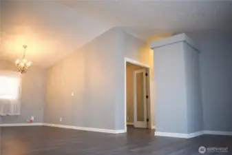 Dining area - hallway to the right leads to den, main bath, and two bedrooms