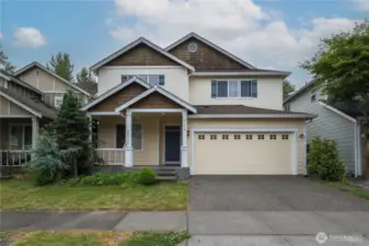 Front view of the home with a huge 2 car garage.