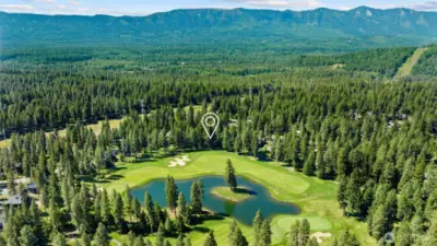 Sunshine and blue skies...tranquil golf and lake setting.