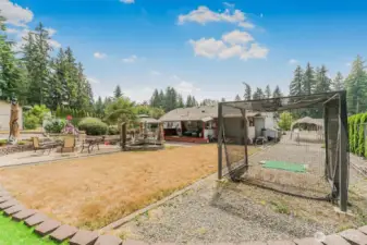 Room for RV parking, golf driving cage included