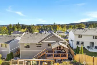 View from stairs towards deck and back of house