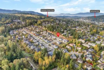 Samish Crest an easy walking distance from your new home.  Trails that take you to a green space next to neighborhood and beyond visible right of center image.  Area can also connect you directly to Galbraith Mountain