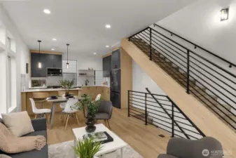 Modern stairs meet warm textures — Architectural stair railings and wood finishes offer a touch of sophistication.