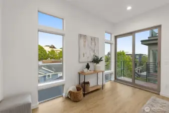 This nook invites relaxation or creative inspiration, plus easy access to your private balcony.