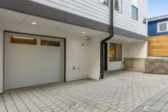 Clean modern lines, private entry, and paved courtyard—welcome to your stylish slice of Seattle.