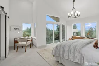 Primary Bedroom on 3rd floor with view balcony.