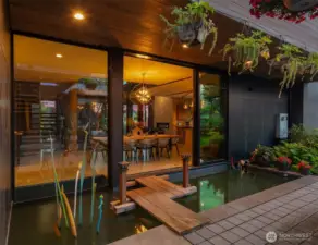 After dinner drinks on the patio?  Just meander across the bridge while koi swim below and enjoy the illuminated glass sculptures along the way!