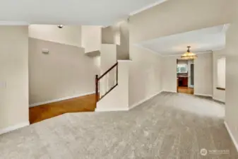 The living room flows seamlessly into the formal dining room for easy entertaining.