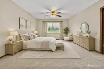 Virtually staged. A spacious primary retreat to unwind and recharge.