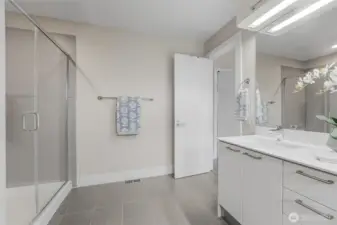 Spa-like primary bath. No running out of hot water having a tankless water heater