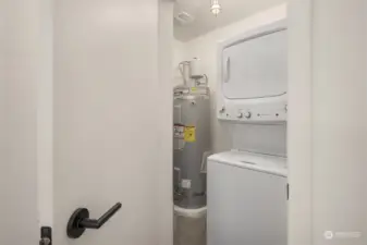 One of the two closets contains its own washer & dryer, and the hot water tank for the entire townhome.