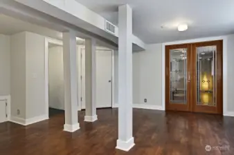 Fully Finished Basement with Wood Floors & French Doors