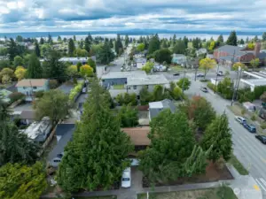 Birds eye view looking west with Puged Sound, Blake Island and Vashon in distance, Holden St on right and 35th Ave SW. This is not a view from the house.