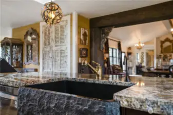 one piece stone sink with chiseled edge and thick granite counter tops with chiseled edge