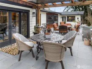 back patio with trellace off kitchen entry to breakfast area