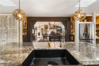 View from your kitchen sink to the dining room and family room area.