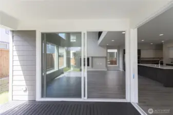 Oversized double sliders join the Great Room with the Outdoor Room.