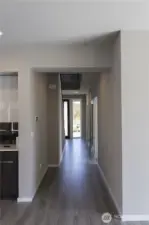 Large foyer leading to the Office/Den, 3/4 BA, Guest Room & Great Room. Timber-look Flooring throughout the Main Floor!