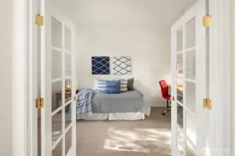 French doors lead you to a den or 2nd bedroom?