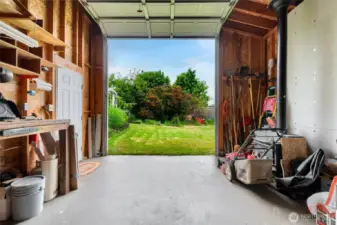 from the back of the shop looking out, there is a wood stove and power for your tools or more lighting or what ever your plans might be.