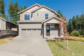 Charming two-story home with beautiful curb appeal in a quiet neighborhood.