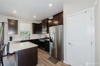 Kitchen with stainless steel appliances and plenty of counter space.
