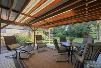 From the great room/kitchen or the living room, you can access this amazing deck--the perfect relaxation space! With views of the mature and fully-fenced yard, it's a dreamy place to enjoy.