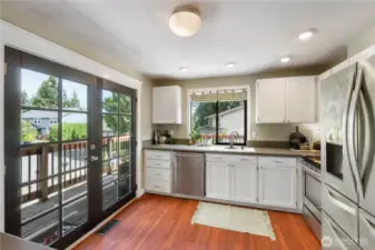 Who doesn't LOVE French Doors? They'll take you out to the wrap-around porch.