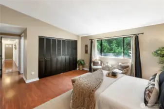 Good size closet space with stylish black bi-fold doors